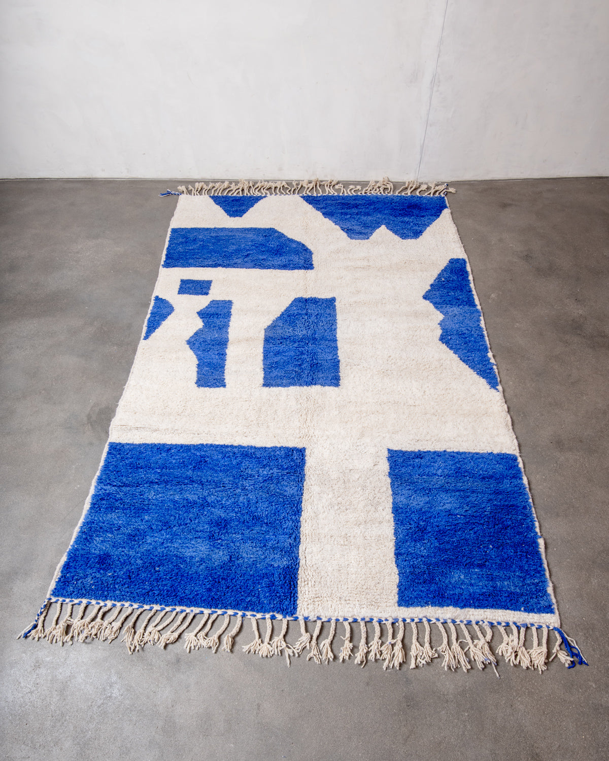 Modern, designer, handcrafted Berber rug from Morocco. Beniourain carpet with beautiful colours and patterns and fluffy wool texture.